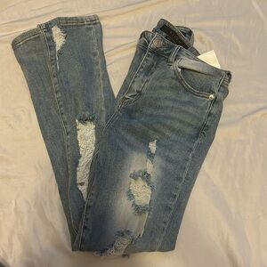 Josie’s boutique brand new skinny jeans with holes